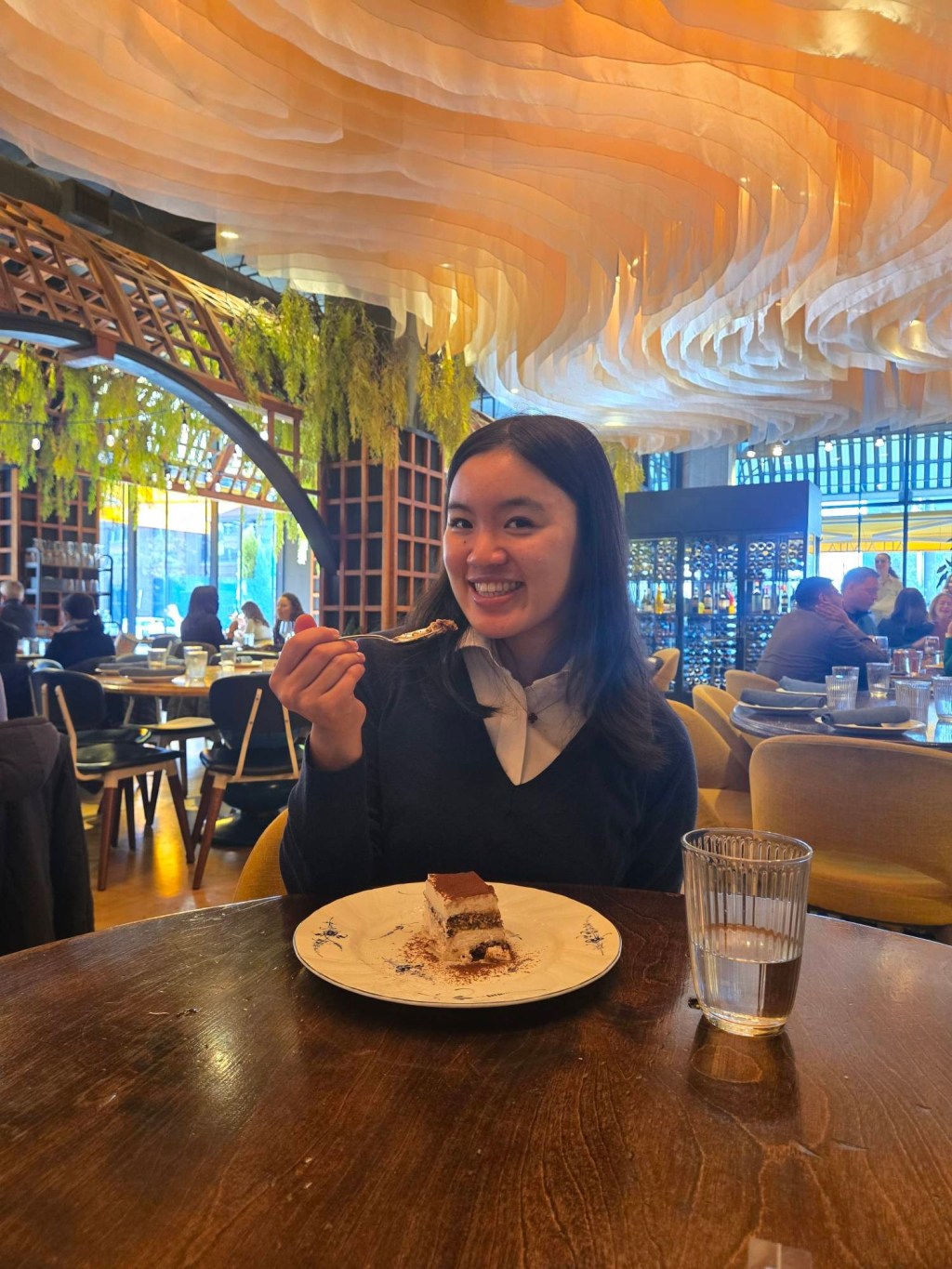 Aimee Xu eating tiramisu